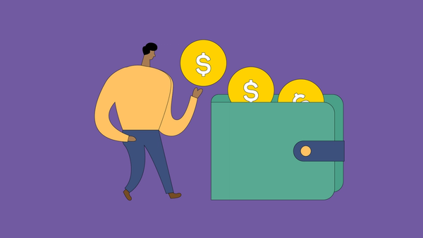 Man putting money into his wallet